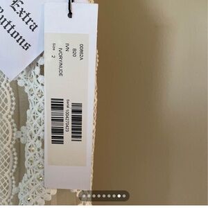 White ivory wedding gown Jovani size 2 new with tags no alterations